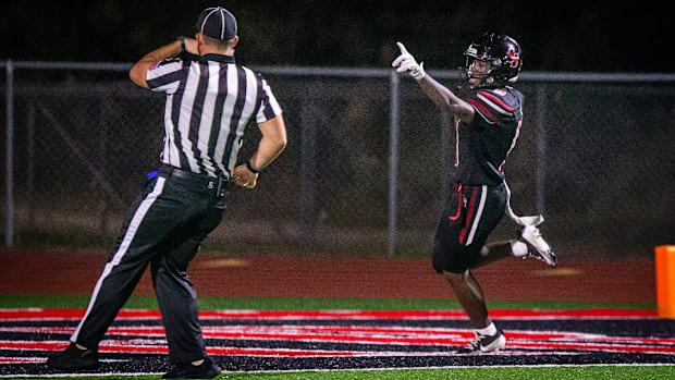 South Sumter Raiders Ja’kyrian Turner (9) signals to the referee a touchdown after running back a 92 yard kick off return 