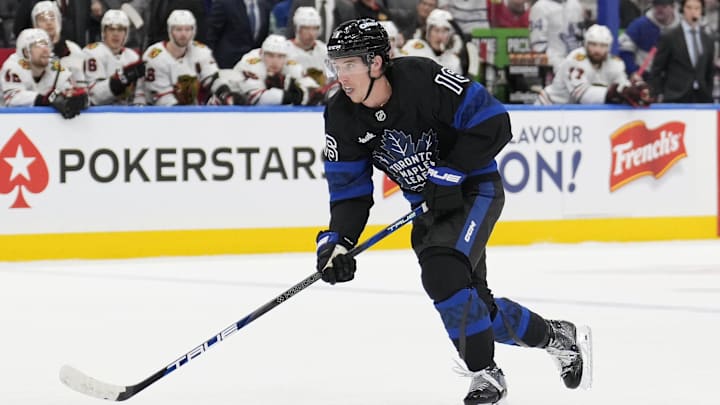 Dec 2, 2024; Toronto, Ontario, CAN; Toronto Maple Leafs forward Mitch Marner (16) skates in on a breakaway against the Chicago Blackhawks during the third period at Scotiabank Arena. Mandatory Credit: John E. Sokolowski-Imagn Images
