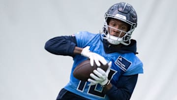 Wide receiver DeAndre Hopkins (10) hauls in a pass during the Tennessee Titans mandatory mini-camp at Ascension Saint Thomas Sports Park in Nashville, Tenn., Tuesday, June 4, 2024.