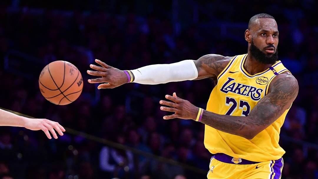 January 15, 2025; Los Angeles, California, USA; Los Angeles Lakers forward LeBron James (23) passes the ball against Miami Heat forward Haywood Highsmith (24) during the second half at Crypto.com Arena. Mandatory Credit: Gary A. Vasquez-Imagn Images January 15, 2025; Los Angeles, California, USA; Los Angeles Lakers forward LeBron James (23) passes the ball against Miami Heat forward Haywood Highsmith (24) during the second half at Crypto.com Arena. Mandatory Credit: Gary A. Vasquez-Imagn Images