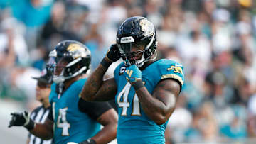 Dec 15, 2024; Jacksonville, Florida, USA; Jacksonville Jaguars defensive end Josh Hines-Allen (41) prepares for the snap against the New York Jets during the third quarter at EverBank Stadium. Mandatory Credit: Morgan Tencza-Imagn Images