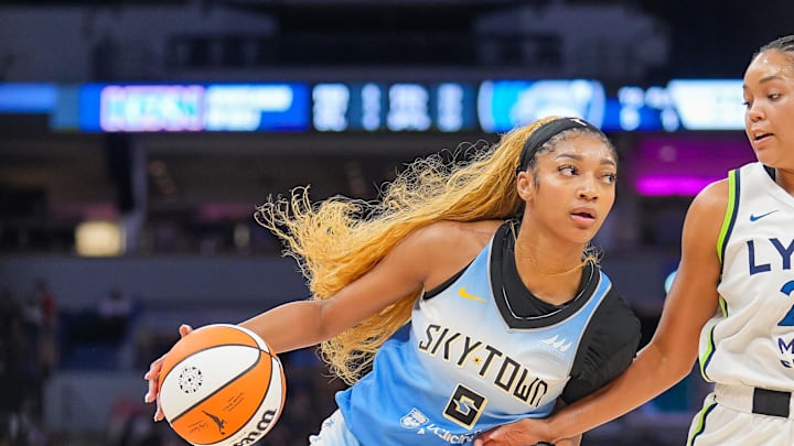 Jul 22, 2025; Minneapolis, Minnesota, USA; Chicago Sky forward Angel Reese (5) dribbles against the Minnesota Lynx in the second quarter at Target Center. Mandatory Credit: Brad Rempel-Imagn Images