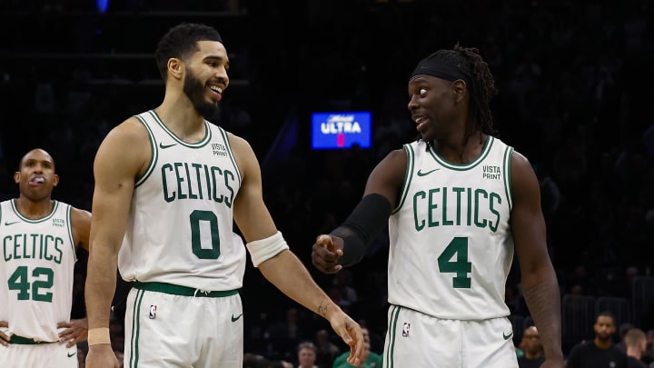 Jan 10, 2024; Boston, Massachusetts, USA; Boston Celtics forward Jayson Tatum (0) has a laugh with guard Jrue Holiday (4) during overtime of their 127-120 win over the Minnesota Timberwolves at TD Garden. Mandatory Credit: Winslow Townson-USA TODAY Sports