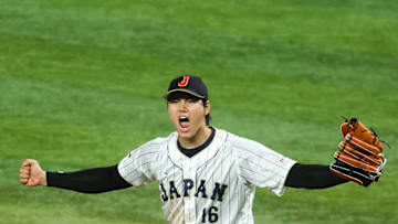 Mar 21, 2023; Miami, Florida, USA; Japan relief pitcher Shohei Ohtani (16) celebrates after