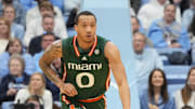 Feb 26, 2024; Chapel Hill, North Carolina, USA; Miami (Fl) Hurricanes guard Matthew Cleveland (0) with the ball in the first half at Dean E. Smith Center. Mandatory Credit: Bob Donnan-Imagn Images