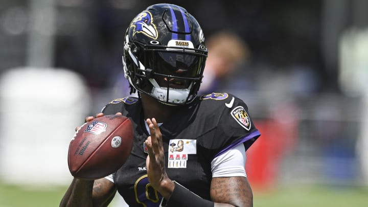 Ravens quarterback Lamar Jackson looks to throw during training camp.