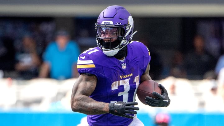 Oct 1, 2023; Charlotte, North Carolina, USA; Minnesota Vikings running back Cam Akers (31) with the ball in the third quarter at Bank of America Stadium. Mandatory Credit: Bob Donnan-USA TODAY Sports