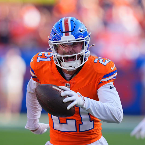 Denver Broncos cornerback Riley Moss (21) celebrates his interception in the second half against the Las Vegas Raiders.