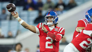 Jaxson Dart #2 of the Mississippi Rebels throws a pass during the second half of the TaxSlayer Gator Bowl against the Duke Blue Devils at EverBank Stadium on January 02, 2025 in Jacksonville, Florida.