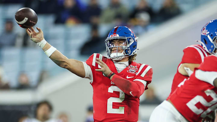 Jaxson Dart #2 of the Mississippi Rebels throws a pass during the second half of the TaxSlayer Gator Bowl against the Duke Blue Devils at EverBank Stadium on January 02, 2025 in Jacksonville, Florida.