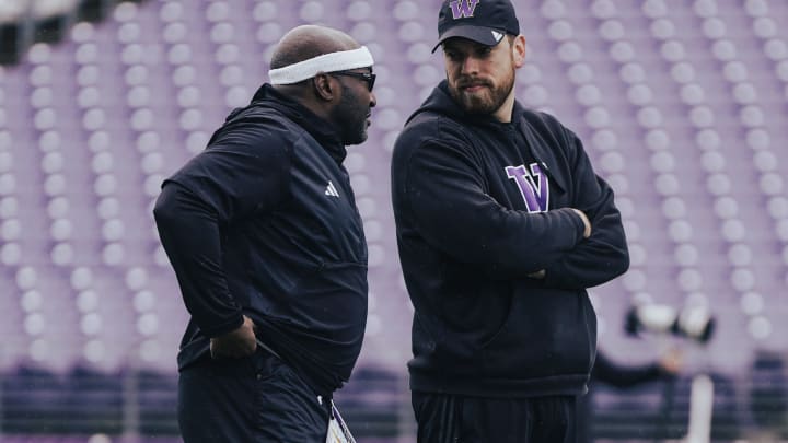 Scottie Graham, left, heads up the Husky running backs. 