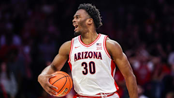 Nov 7, 2025; Tucson, Arizona, USA; Arizona Wildcats forward Tobe Awaka (30) reacts after a foul was called on him during the second half of the game against the Utah Tech Trailblazers at McKale Memorial Center. Mandatory Credit: Aryanna Frank-Imagn Images