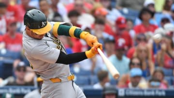 Jul 14, 2024; Philadelphia, Pennsylvania, USA; Oakland Athletics outfielder Brent Rooker (25) hits a two-run home run against the Philadelphia Phillies during the fourth inning at Citizens Bank Park. Mandatory Credit: Eric Hartline-USA TODAY Sports
