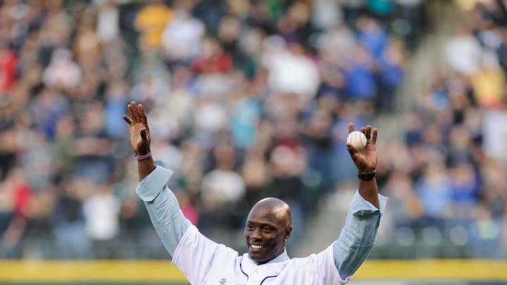 Seattle Mariners former player Mike Cameron throws out the first pitch prior to the game against the Oakland Athletics at Safeco Field. Oakland defeated Seattle 4-0 in 2012.