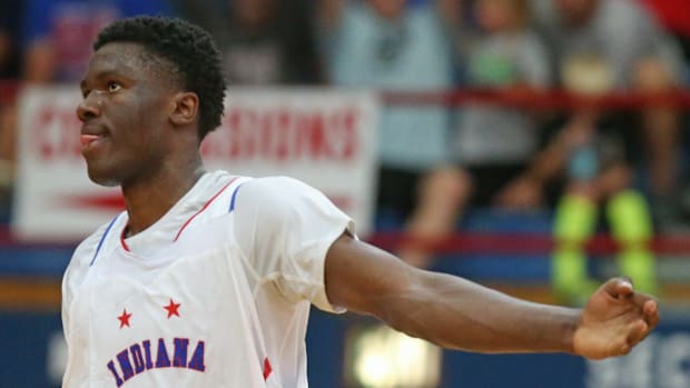 Indiana Senior All-Star Flory Bidunga (1) celebrates after making a three-point shot during the Indiana Boys Junior-Senior Al