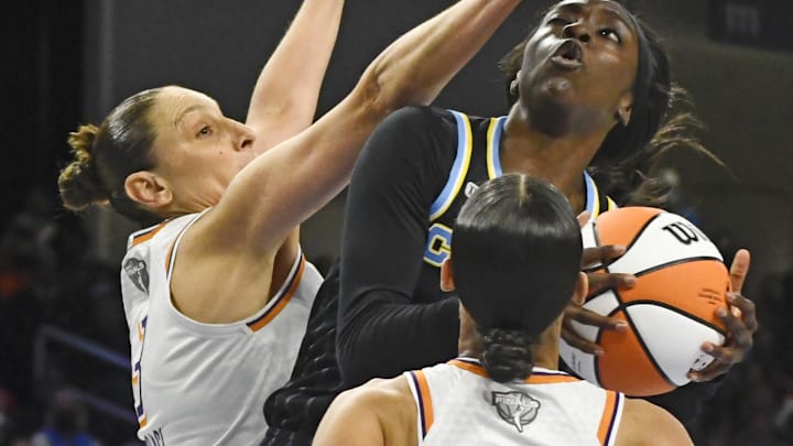 Oct 17, 2021; Chicago, Illinois, USA; Chicago Sky guard/forward Kahleah Copper (2), center, shoots against Phoenix Mercury guard Diana Taurasi (3) and Phoenix Mercury guard Skylar Diggins-Smith (4) during the second half of game four of the 2021 WNBA Finals at Wintrust Arena. Mandatory Credit: Matt Marton-Imagn Images