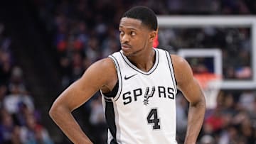 Mar 7, 2025; Sacramento, California, USA; San Antonio Spurs guard De'Aaron Fox (4) looks on during the first quarter of the game against the Sacramento Kings at Golden 1 Center.