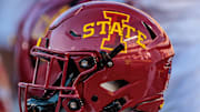 Nov 9, 2024; Kansas City, Missouri, USA; Iowa State Cyclones helmets on the bench during the first quarter against the Kansas Jayhawks at GEHA Field at Arrowhead Stadium. 