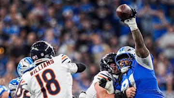 Detroit Lions defensive tackle Tyleik Williams (91) blocks a pass from Chicago Bears quarterback Caleb Williams (18) during the second half at Ford Field in Detroit on Sunday, Sept. 14, 2025.