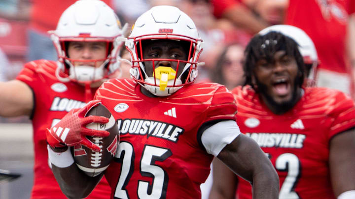 Louisville Cardinals running back Isaac Brown (25) scores a 77 yard rush touchdown during their game against the Austin Peay Governors on Saturday, Aug. 31, 2024 at L&N Federal Credit Union Stadium in Louisville, Ky.