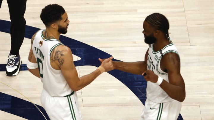Jun 12, 2024; Dallas, Texas, USA; Boston Celtics forward Jayson Tatum (0) and guard Jaylen Brown (7) celebrate after defeating the Dallas Mavericks in game three of the 2024 NBA Finals at American Airlines Center. Mandatory Credit: Peter Casey-USA TODAY Sports