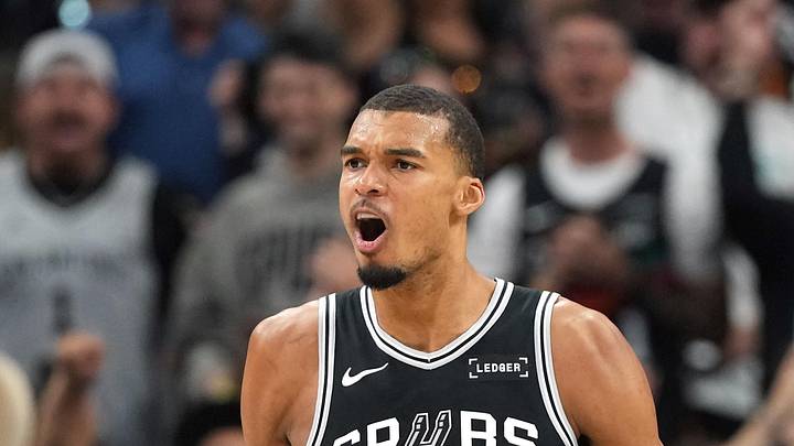 May 12, 2026; San Antonio, Texas, USA; San Antonio Spurs forward Victor Wembanyama and guard Devin Vassell (24) react during the first half of game five of the second round of the 2026 NBA Playoffs against the Minnesota Timberwolves at Frost Bank Center. Mandatory Credit: Scott Wachter-Imagn Images