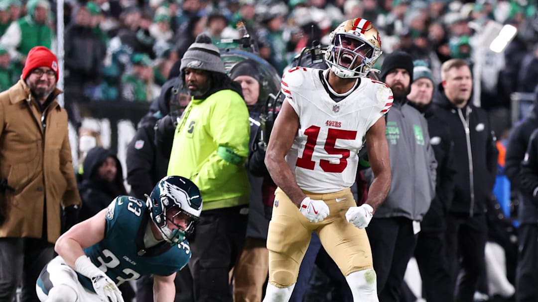 Jan 11, 2026; Philadelphia, PA, USA; San Francisco 49ers wide receiver Jauan Jennings (15) reacts in front of Philadelphia Eagles cornerback Cooper DeJean (33) after a first down catch in an NFC Wild Card Round game at Lincoln Financial Field. Mandatory Credit: Bill Streicher-Imagn Images
