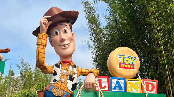 Woody welcomes guests to Toy Story Land at Disney's Hollywood Studios. 