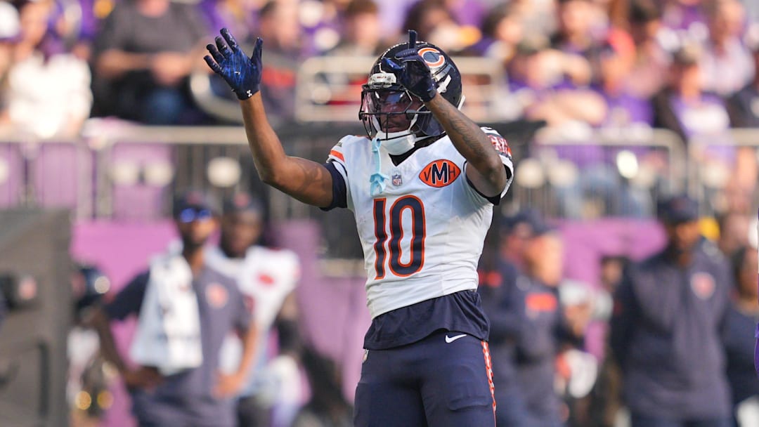 Nov 16, 2025; Minneapolis, Minnesota, USA; Chicago Bears wide receiver Luther Burden III (10) reacts after a run for a gain during the second quarter against the Minnesota Vikings at U.S. Bank Stadium. Mandatory Credit: Brad Rempel-Imagn Images