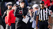 Cincinnati Bearcats head coach Scott Satterfield, left, watches an instant replay video on the jumbo screen in the fourth quarter of a college football game between the Cincinnati Bearcats and West Virginia Mountaineers, Saturday, Nov. 9, 2024, at Nippert Stadium in Cincinnati. Mountaineers won 31-24.