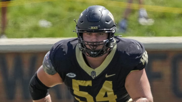 Sep 9, 2023; Winston-Salem, North Carolina, USA; Wake Forest Demon Deacons offensive lineman Matt Gulbin (54) during the second quarter at Allegacy Federal Credit Union Stadium. Mandatory Credit: Jim Dedmon-Imagn Images Sep 9, 2023; Winston-Salem, North Carolina, USA; Wake Forest Demon Deacons offensive lineman Matt Gulbin (54) during the second quarter at Allegacy Federal Credit Union Stadium. Mandatory Credit: Jim Dedmon-Imagn Images