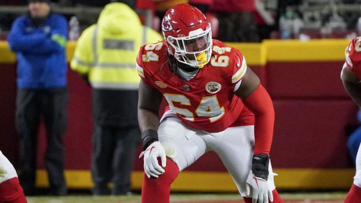 Dec 10, 2023; Kansas City, Missouri, USA; Kansas City Chiefs guard Joe Thuney (62) and offensive tackle Wanya Morris (64) at the line of scrimmage against the Buffalo Bills during the game at GEHA Field at Arrowhead Stadium. Mandatory Credit: Denny Medley-USA TODAY Sports