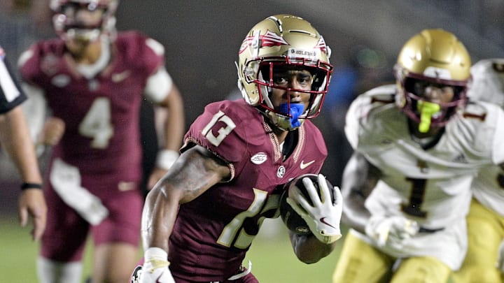 Florida State Seminoles running back Jaylin Lucas (13) runs the ball during the first half against the Boston College Eagles at Doak S. Campbell Stadium.