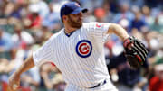 June 15, 2012; Chicago, IL, USA; Chicago Cubs starting pitcher Ryan Dempster delivers a pitch during the first inning against the Boston Red Sox at Wrigley Field.  