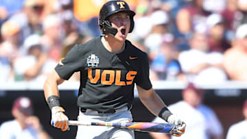 Tennessee's Dylan Dreiling (8) celebrates after hitting a two-run home run against Texas A&M in game two of the NCAA College World Series finals at Charles Schwab Field in Omaha, Neb., on Sunday, June 23, 2024.