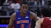 Mar 28, 2025; Detroit, Michigan, USA;  Detroit Pistons center Jalen Duren (0) dribbles defended by Cleveland Cavaliers center Jarrett Allen (31) in the first half at Little Caesars Arena. Mandatory Credit: Rick Osentoski-Imagn Images