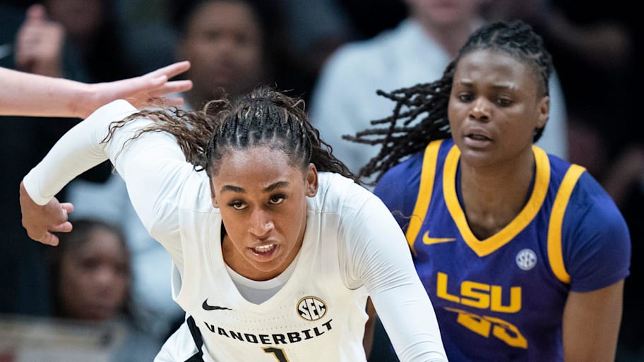 Vanderbilt guard Mikayla Blakes (1) drives away from LSU pressure.