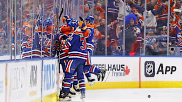 The Edmonton Oilers celebrate a goal scored by defensemen Darnell Nurse (25)