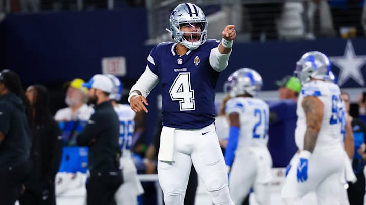 Dallas Cowboys QB Dak Prescott reacts after throwing a touchdown pass during the first half against the Detroit Lions Dallas Cowboys QB Dak Prescott reacts after throwing a touchdown pass during the first half against the Detroit Lions