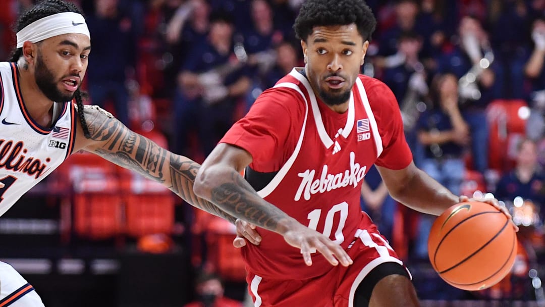 Nebraska's Jamarques Lawrence drives the ball past Kylan Boswell during the second half of the Huskers' 83-80 win over Illinois.