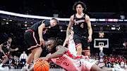 Ohio State Buckeyes guard Bruce Thornton (2) scrambles for a loose ball in front of IU Indy Jaguars guard Micah Davis (4) during the NCAA men's basketball game at Value City Arena in Columbus on Nov. 3, 2025. Ohio State won the season opener 118-102.