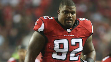 Aug 23, 2014; Atlanta, GA, USA; Atlanta Falcons nose tackle Travian Robertson (92) jogs toward the locker room after the first half of their game against the Tennessee Titans at the Georgia Dome. The Titans won 24-17. Mandatory Credit: Jason Getz-Imagn Images