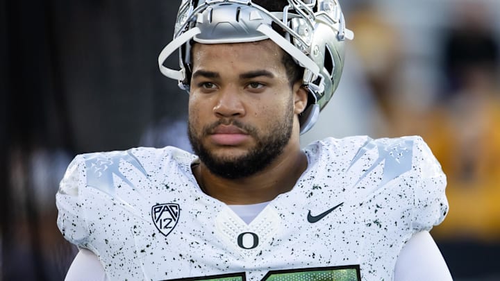 Nov 18, 2023; Tempe, Arizona, USA; Oregon Ducks offensive lineman Nishad Strother (50) against the Arizona State Sun Devils at Mountain America Stadium. Mandatory Credit: Mark J. Rebilas-Imagn Images