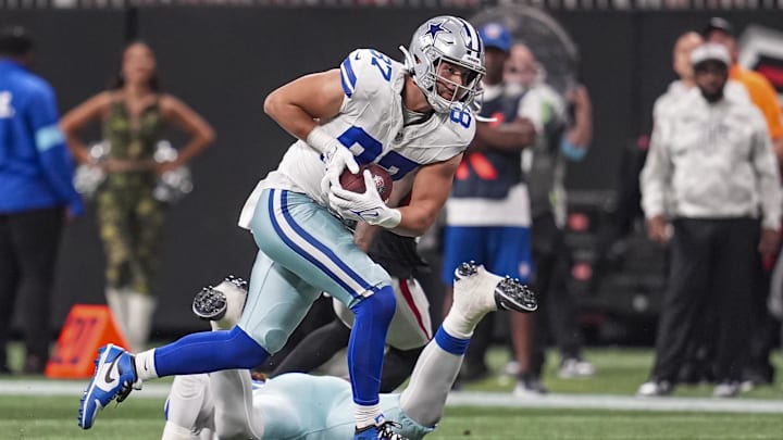 Dallas Cowboys tight end Jake Ferguson runs after a catch against the Atlanta Falcons.