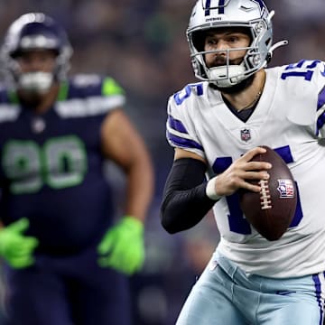 Will Grier runs with the ball in an NFL game for Dallas.