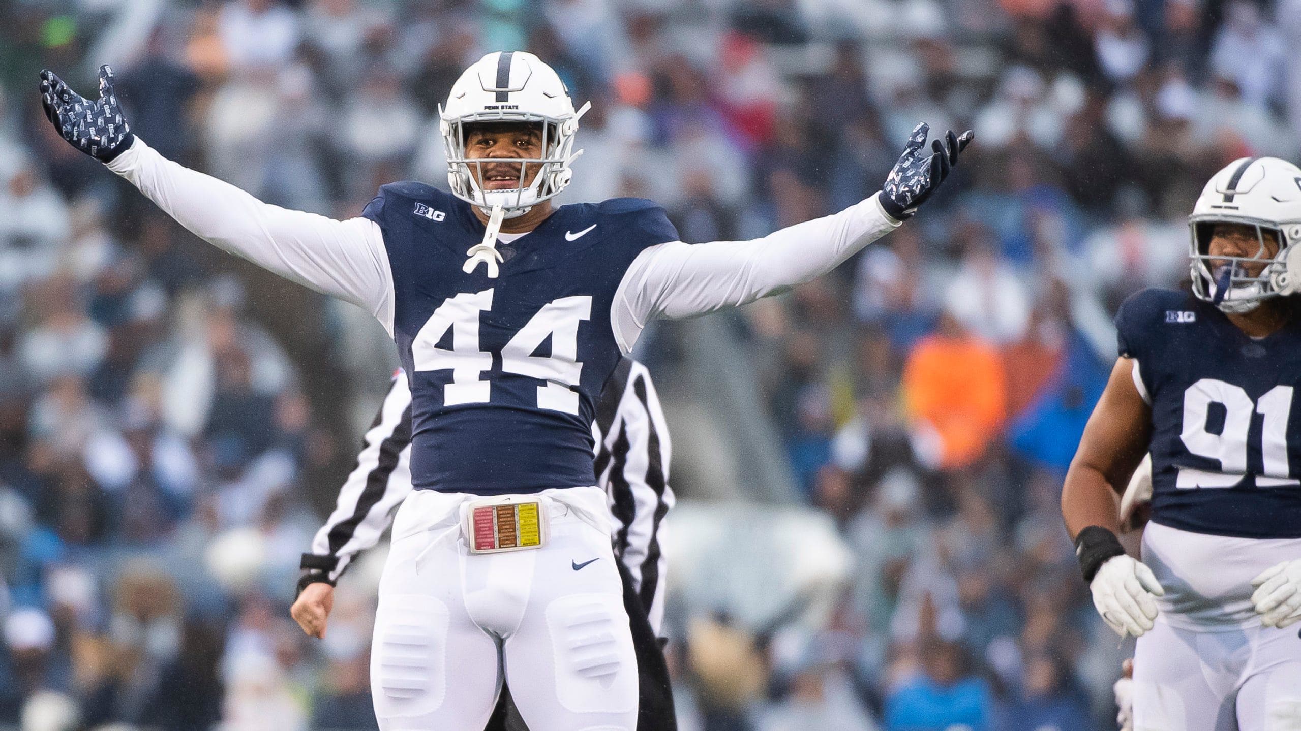 Penn State defensive end Chop Robinson (44) celebrates after sacking Massachusetts quarterback