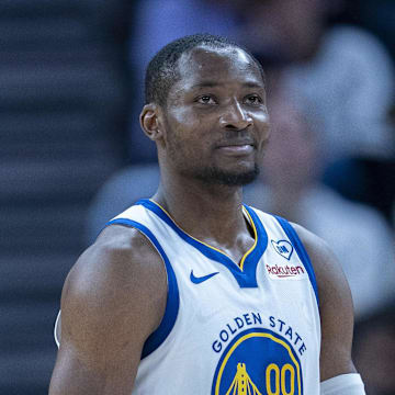 Jan 30, 2024; San Francisco, California, USA;  Golden State Warriors forward Jonathan Kuminga (00) reacts after the foul call during the fourth quarter against the Philadelphia 76ers at Chase Center. Mandatory Credit: Neville E. Guard-Imagn Images