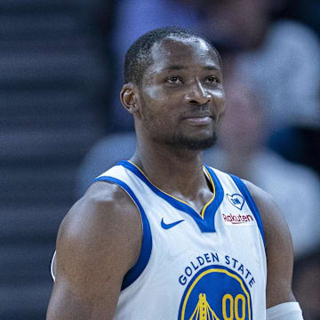 Jan 30, 2024; San Francisco, California, USA;  Golden State Warriors forward Jonathan Kuminga (00) reacts after the foul call during the fourth quarter against the Philadelphia 76ers at Chase Center. Mandatory Credit: Neville E. Guard-Imagn Images
