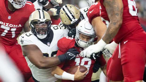 Arizona Cardinals quarterback Desmond Ridder (19) is sacked by New Orleans Saints defensive tackle Nathan Shepherd (93) 