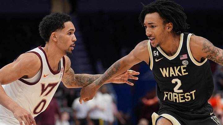 Mar 10, 2026; Charlotte, NC, USA; Wake Forest Demon Deacons forward Juke Harris (2) dribbles the ball against Virginia Tech Hokies guard Jailen Bedford (0) during the second half at Spectrum Center. Mandatory Credit: Jim Dedmon-Imagn Images